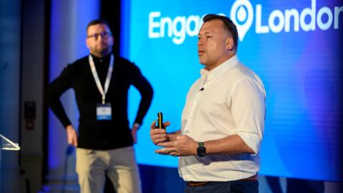 Speakers at an Acquia engage event presenting on stage