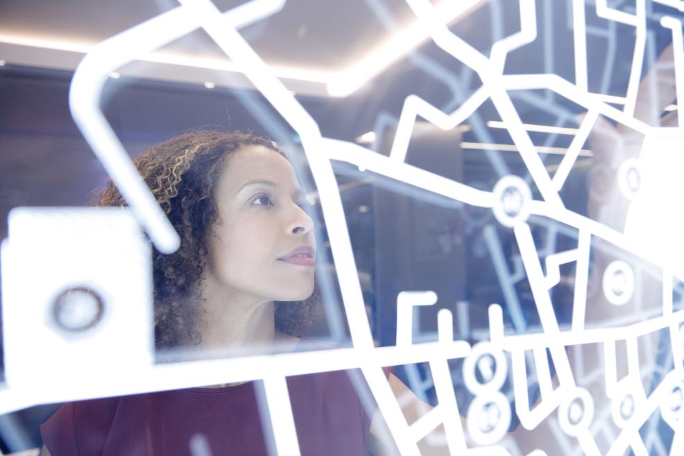 woman looking at tech design