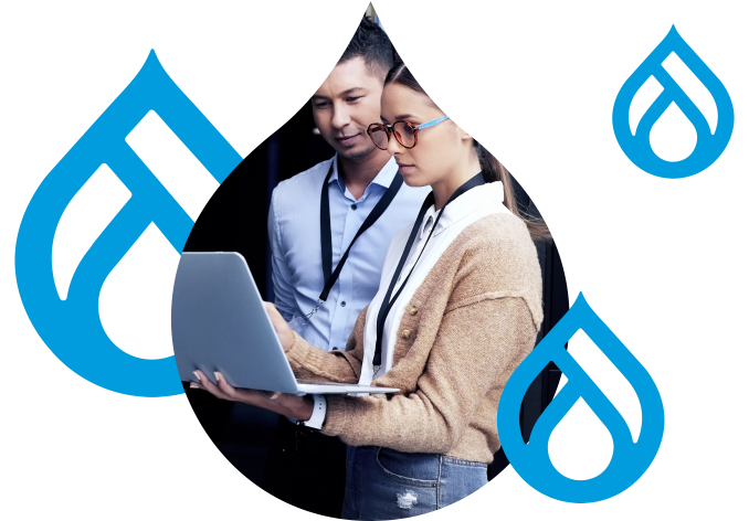 stylized graphic of Drupal Logos surrounding two people looking over a laptop