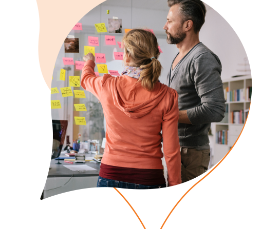 orange acquia droplets with an image of two people talking about sticky notes on a wall