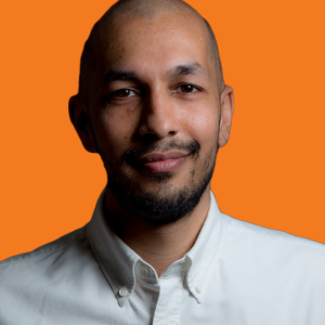 Arush Kochhar headshot with orange background