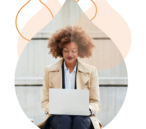 orange acquia droplets with an image of a woman on a laptop on steps