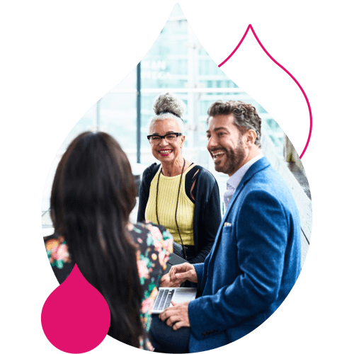 3 people chatting surrounded by pink droplets