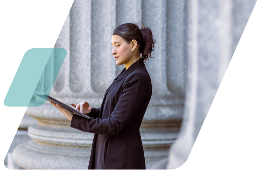 image of a person standign in front of a government building masked by a parallelogram