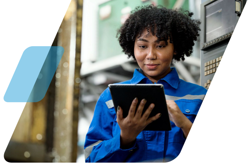 image of a person checking a device in a utility plant masked by a parallelogram